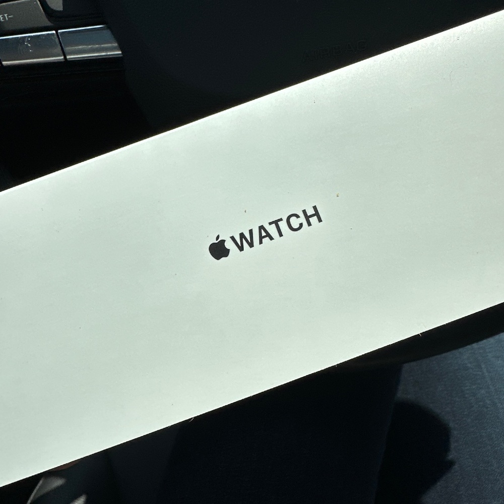 Small white Apple Watch band.